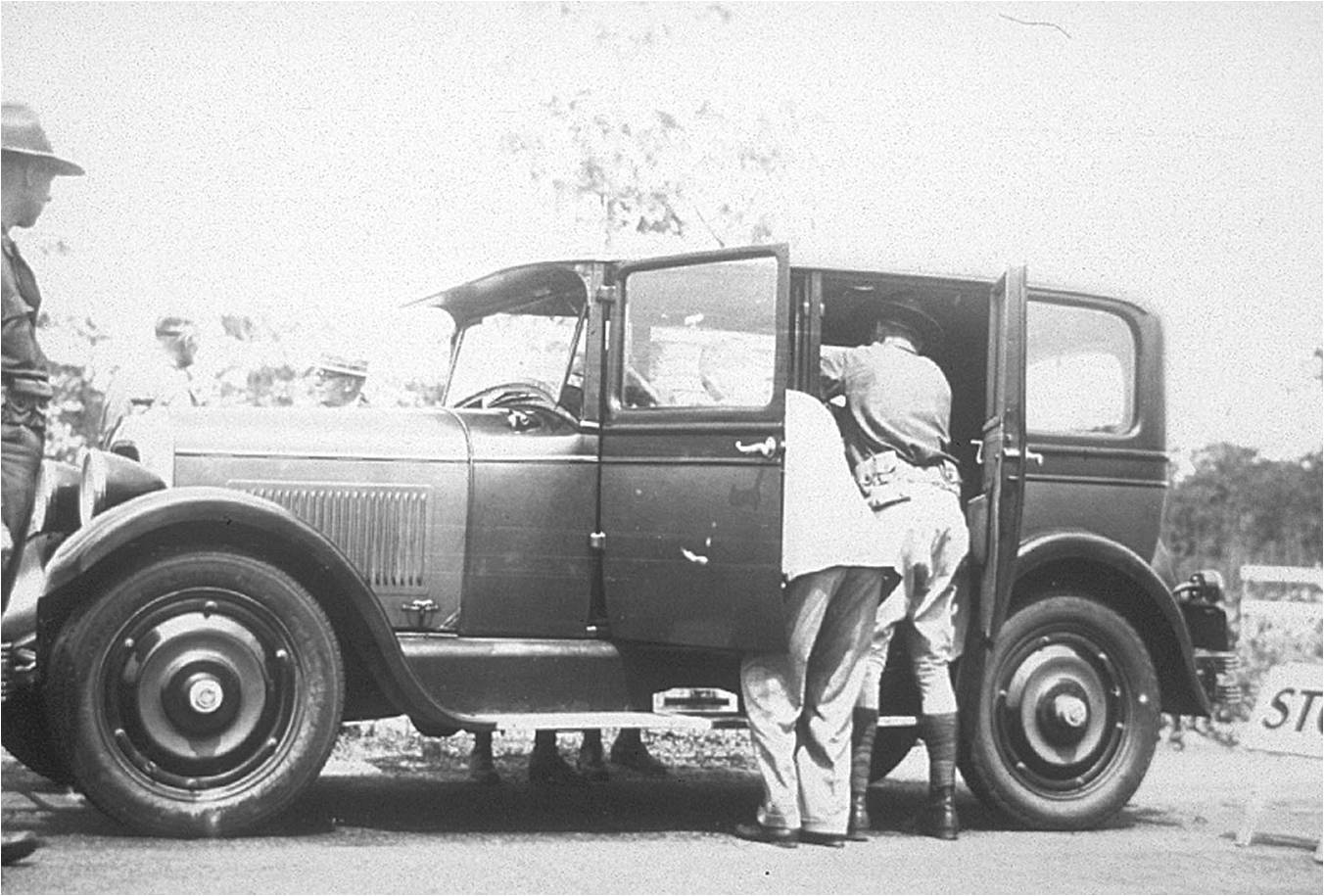 Florida National Guard personnel inspect a truck for fruit affected by the Mediterranean fruit fly (circa 1929). Photo courtesy of the Florida Department of Agriculture and Consumer Services.