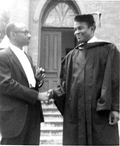 John D. Due Jr. being congratulated by Rev. C.K. Steele at FAMU Law School graduation in Tallahassee.
