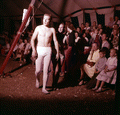 Acrobatic performers walking past the crowd at the circus in Sarasota, Florida.