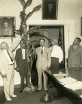 Cabinet members with stalk of corn from the Florida State Hospital farm.