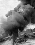 Fire being fought at the W.J. Boynton and Son turpentine distillery in Tallahassee, Florida.