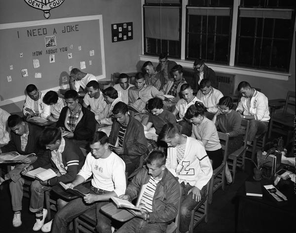 High school students studying for a Tallahassee Democrat article "Teenagers Could Make Better Grades".