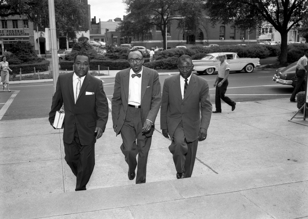 Francisco A. Rodriguez, Reverend C.K. Steele and Reverend Daniel B. Speed walking towards the courthouse in Tallahassee.