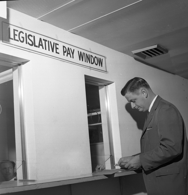 Florida State Representative Don Fuqua at the legislative pay window in Tallahassee.
