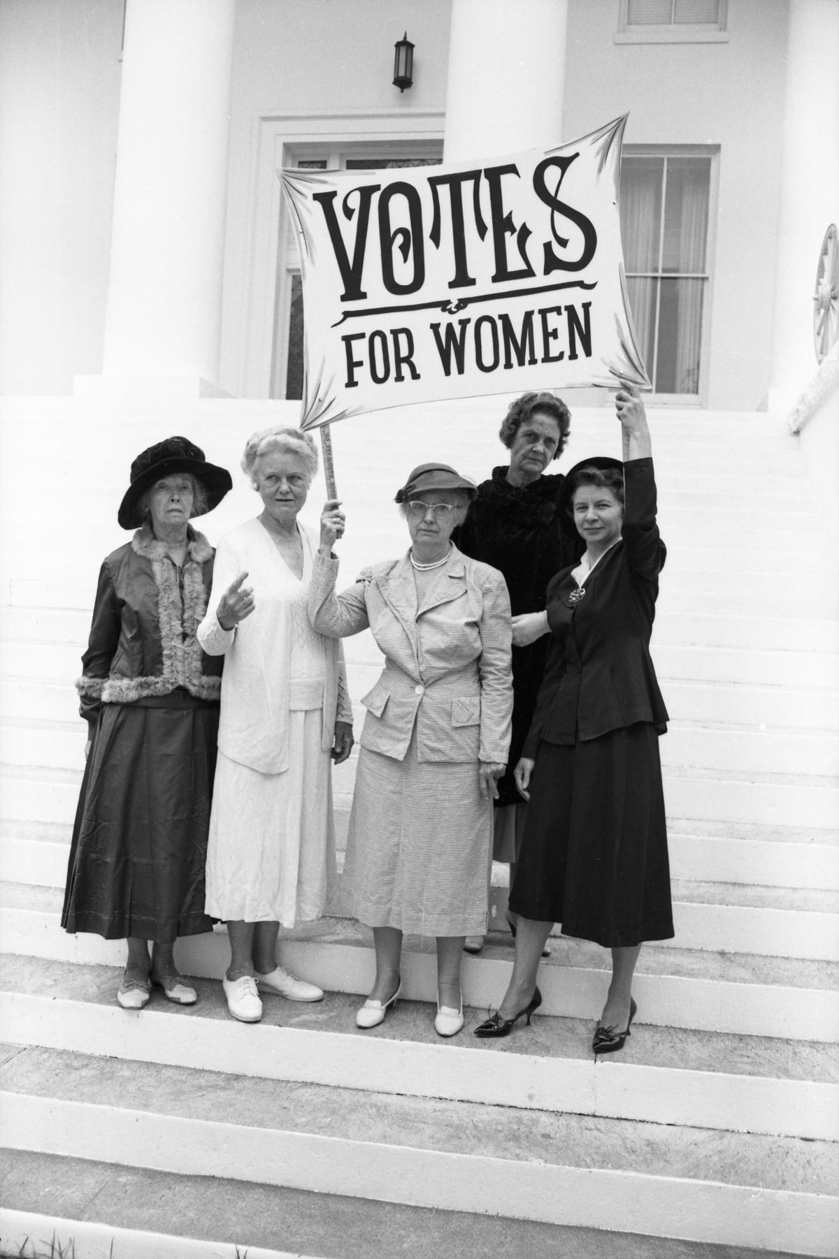 League of Women Voters recreating scenes of suffrage activism on the steps of the old Florida Capitol, 1963.