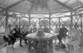 Guests sitting in gazebo during party hosted by Charles Delemere Haines in Altamonte Springs.