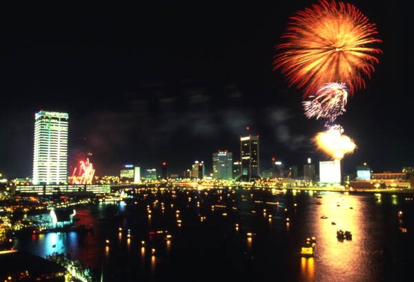 Fireworks over skyline during festival in Jacksonville, ca. 1969