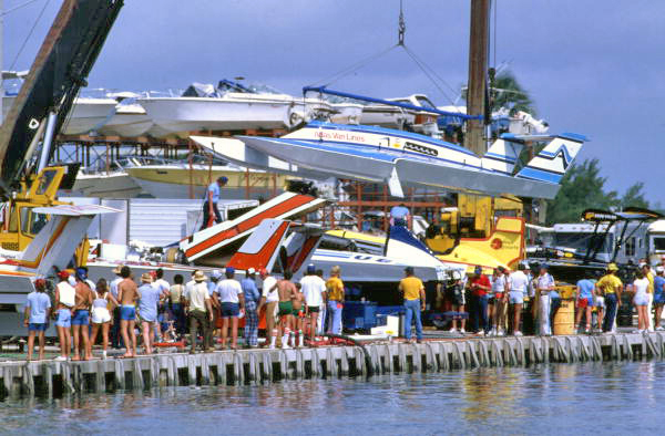 Atlas Van Lines hydroplane being hoisted by crane in Miami.