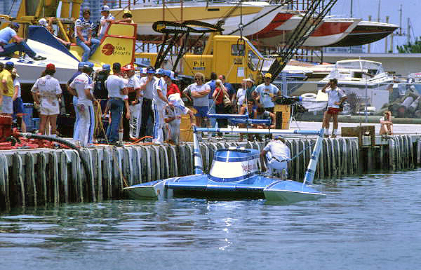 Atlas Van Lines hydroplane being hoisted by crane in Miami.