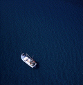 Aerial view showing a fishing boat off the southeast coast of Florida.