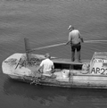 Oystermen at work harvesting oysters in Apalachicola, Florida.