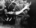 Mary Dwight gives Santa (Newton Perry) an endearing hug for bringing gifts to the "mermaids" - Weeki Wachee, Florida.