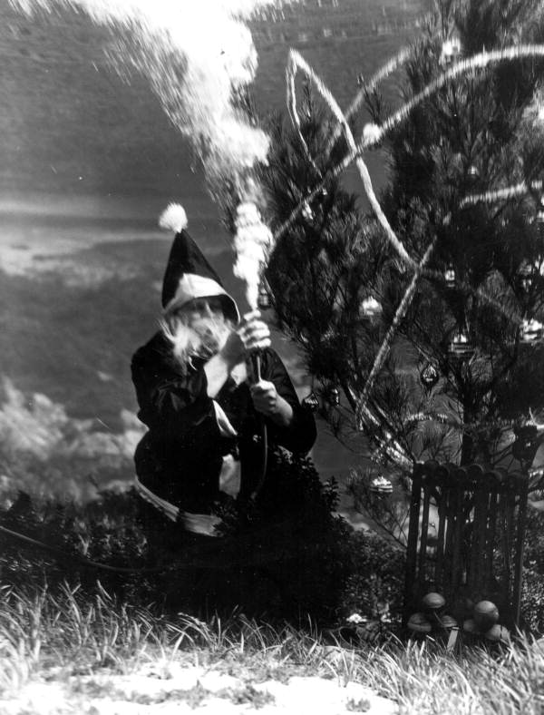 Santa (Newton Perry) arrives early at the underwater Christmas party and has to wait for the "mermaids" - Weeki Wachee, Florida.
