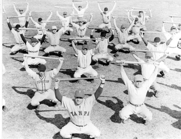 Calisthenics led by Tampa Smokers director Joe Abreu at a training camp in Tampa (February 20, 1948).