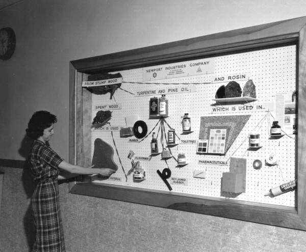 An employee has product samples hung on the board - Pensacola, Florida.