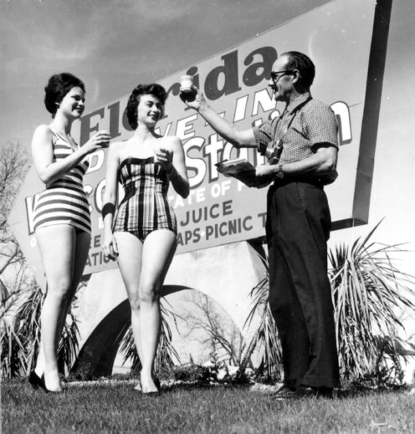 People in front of welcome sign- Havana, Florida (1962). 