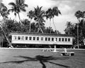 A young girl watches the passenger car "Rambler" on display at the Flagler Museum - Palm Beach, Florida.