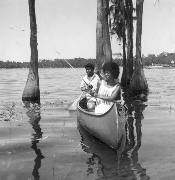 African American college students fishing at the Florida State University Reservation
