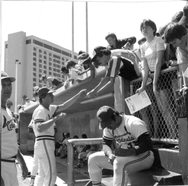 Fans getting autographs from members of the St. Louis Cardinals during spring training in St. Petersburg (1977).