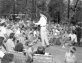 Gamble Rogers performing in front of a large crowd at the Florida Folk Festival - White Springs, Florida