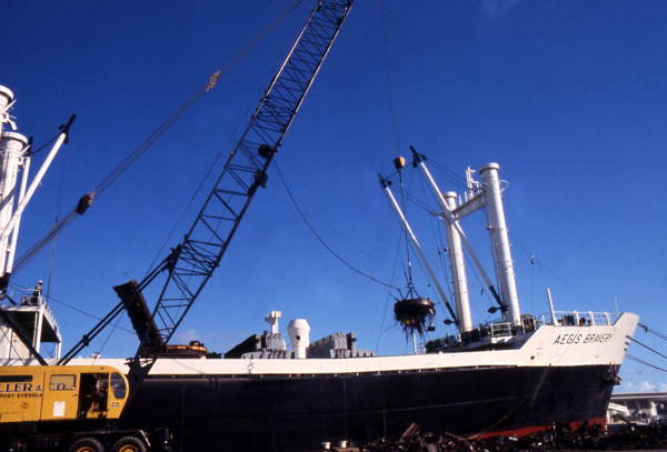 Aegis Bravery loading or unloading scrap metal at Port Everglades, Florida.