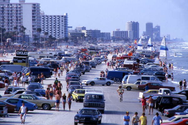View showing cars and crowds at Daytona Beach, Florida, ca. 1976