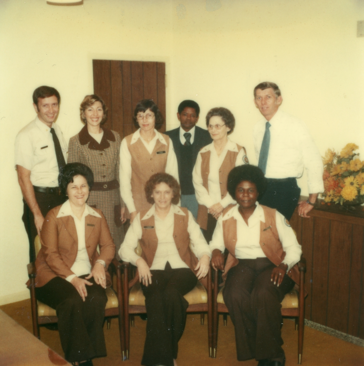 F.C.I. Superintendent William Booth in group portrait with promotion recipients.