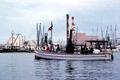 "African Queen" steam launch cruising in Key West Bight - Key West, Florida.