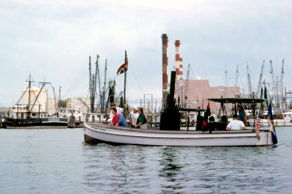 "African Queen" steam launch cruising in Key West Bight - Key West, Florida.