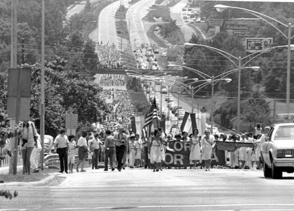 Pro-ERA forces march up Tallahassee's Apalachee Parkway to the capitol to show their support for the controversial amendment - Tallahassee, Florida.
