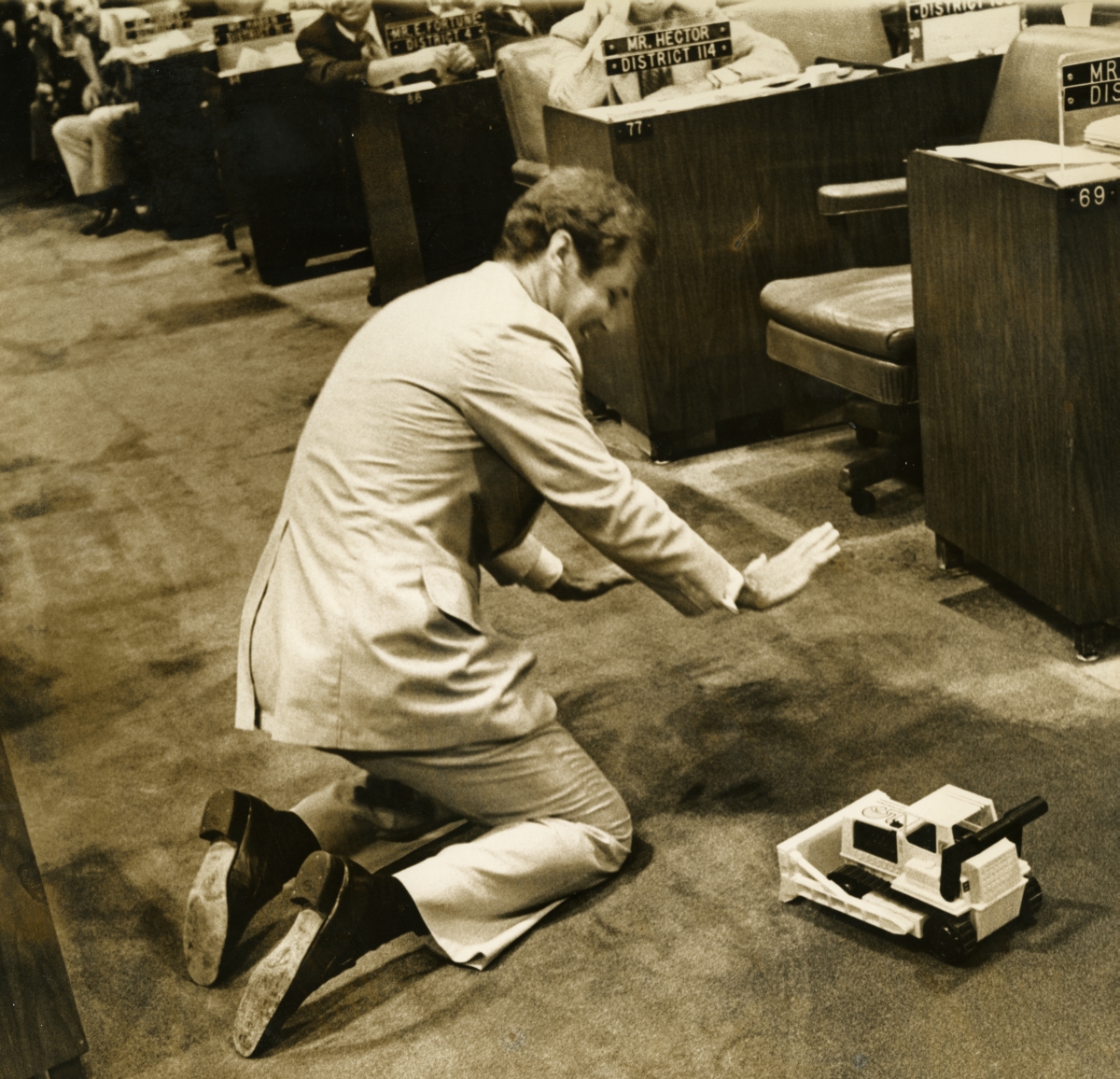 Representative Bill Nelson with a toy bulldozer - Tallahassee, Florida (18 May 1977)