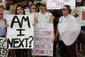 Close-up view showing student demonstrators with their signs during the Never Again Rally in Tallahassee.