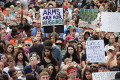 Close-up view showing student demonstrators and gun-control activists at the Never Again Rally in Tallahassee.