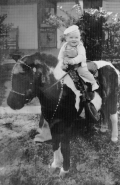 10-month-old Michael Pearce Stevens (later Pfeifer) on a pony.