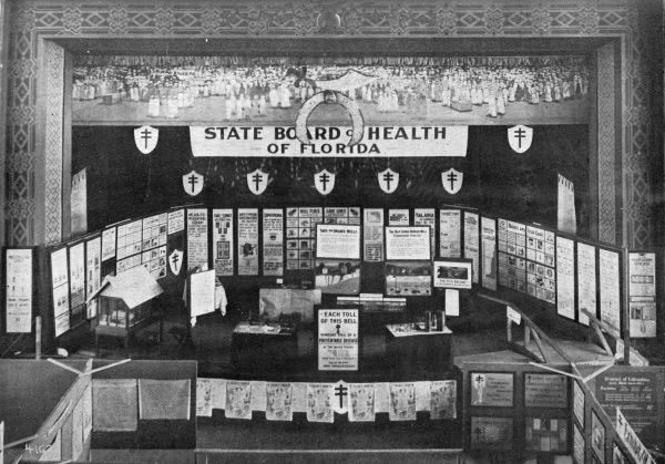 Florida's health exhibit on display in an auditorium, January 1915. Florida Health Notes, January 1915, page 4. State Library of Florida.