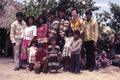 Photographer's wife Gladys posing with Susie Billie and her family at their camp in Naples.