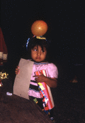 Seminole child at the Christmas celebration at Susie Billie's village in Ft. Myers.