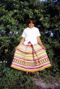 Marie Billie showing new skirt during Christmas celebration at Susie Billie's village in Ft. Myers.