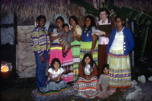 Photographer's wife Gladys posing with Susie Billie's family.