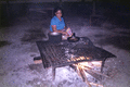 Susie Billie at Immokalee Village cooking chickee.