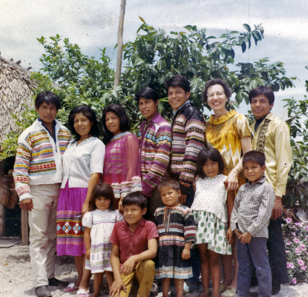 Photographer's wife Gladys posing with Susie Billie and her family at their camp in Naples.