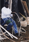 Alphonso Jennings making baskets during the Greenville Country Christmas Festival.