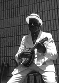 "Washboard Bill" Cooke playing a "banjo uke" at the Florida Folk Festival - White Springs, Florida.