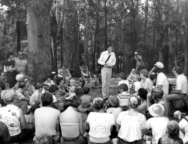 Gamble Rogers telling a tall tale at the 1978 Florida Folk Festival in White Springs, Florida.