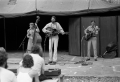 Dale & Linda Crider performing with Gamble Rogers at the Old Marble Stage during the 1982 Florida Folk Festival.