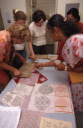 Jaya Radhakrishnan leading a workshop in Indian rangoli, or sandpainting, at the 1998 Florida Folk Festival.