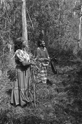 Susie Jim Billie and daughter Agnes Cypress searching for medicinal plants and herbs- Big Cypress Seminole Indian Reservation, Florida