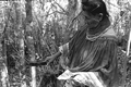 Susie Jim Billie collecting medicinal bark- Big Cypress Seminole Indian Reservation, Florida