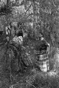 Susie Jim Billie and daughter Agnes Cypress searching for medicinal plants and herbs- Big Cypress Seminole Indian Reservation, Florida