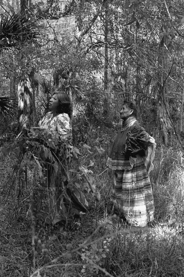 Susie Jim Billie and daughter Agnes Cypress searching for medicinal plants and herbs- Big Cypress Seminole Indian Reservation, Florida